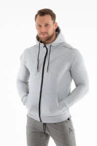 Male model wearing APEX Zip Hoodie Gray — gym to lifestyle