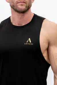 Male model wearing META Tank Top Black — gym to lifestyle
