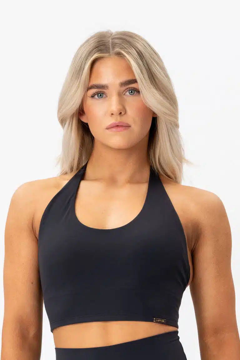 Women's AURA Top black halter-neck sports bra — front view, snug fit